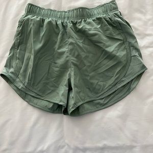 Green Nike shorts